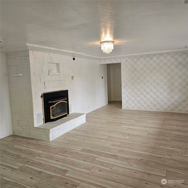 unfurnished living room featuring light wood-type flooring