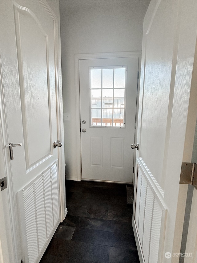 entryway featuring dark wood-type flooring