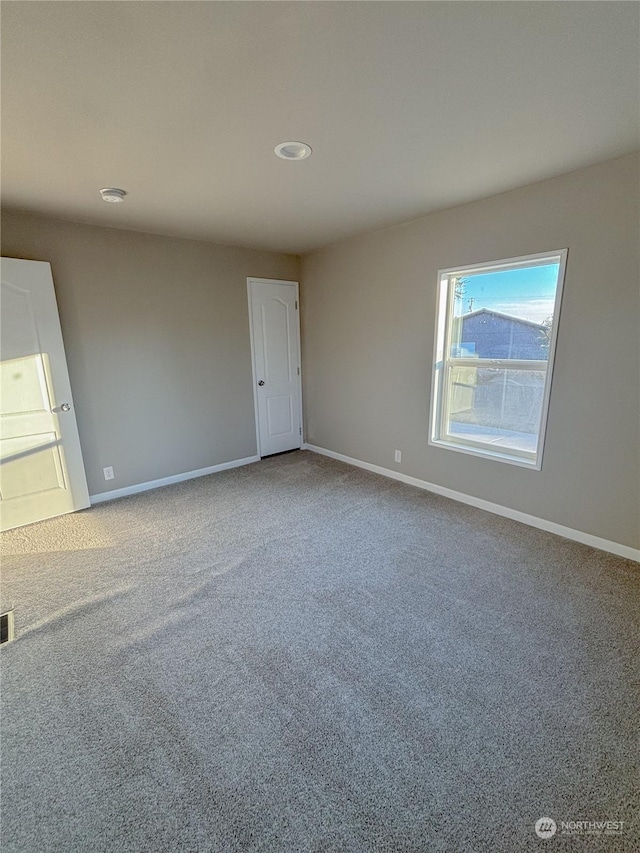 1223 Jones Dr, Walla Walla, WA 99362 - spare room featuring carpet floors and baseboards