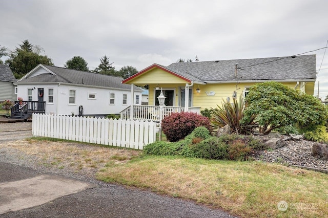 single story home with covered porch