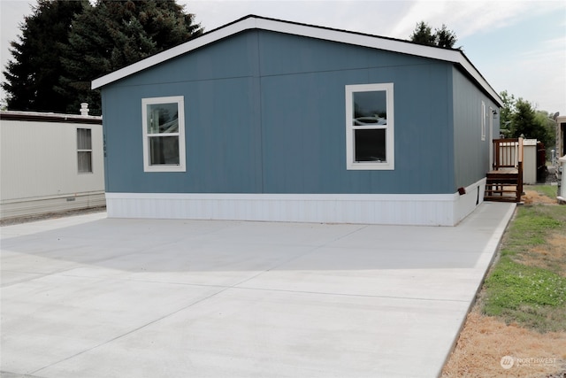 view of home's exterior with a patio area