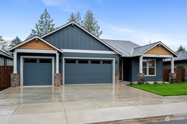 craftsman inspired home featuring a garage