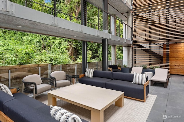 view of patio / terrace featuring a balcony and an outdoor hangout area