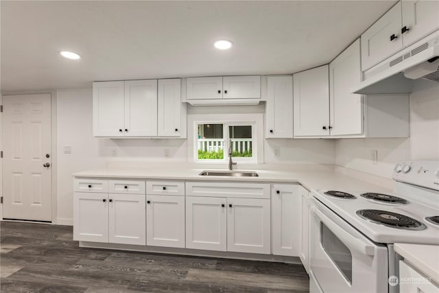 kitchen with white range with electric stovetop, light countertops, under cabinet range hood, white cabinetry, and a sink