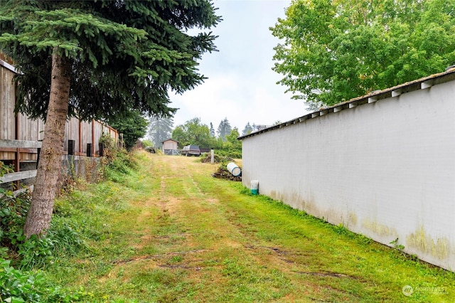 view of yard featuring fence