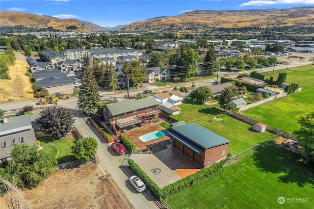 drone / aerial view featuring a mountain view