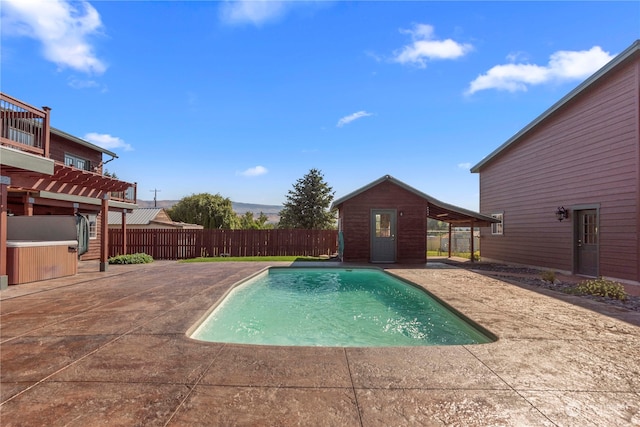 view of swimming pool featuring a pergola and a patio area