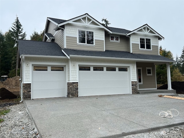 craftsman-style house featuring a garage