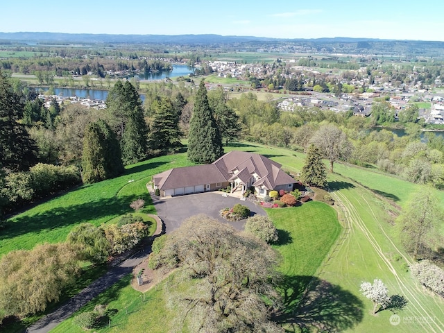 drone / aerial view with a water view