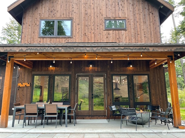 back of house featuring french doors and a patio area