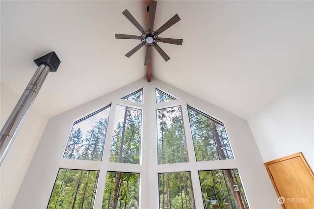 details featuring ceiling fan and beamed ceiling