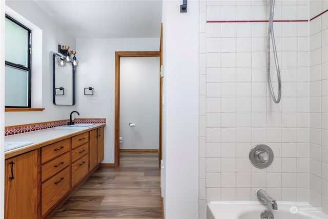 bathroom featuring vanity and hardwood / wood-style flooring