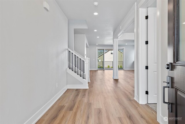 hallway featuring light wood-type flooring