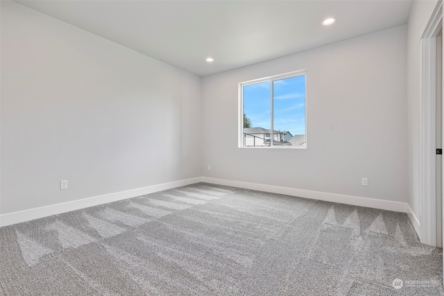 unfurnished room with carpet