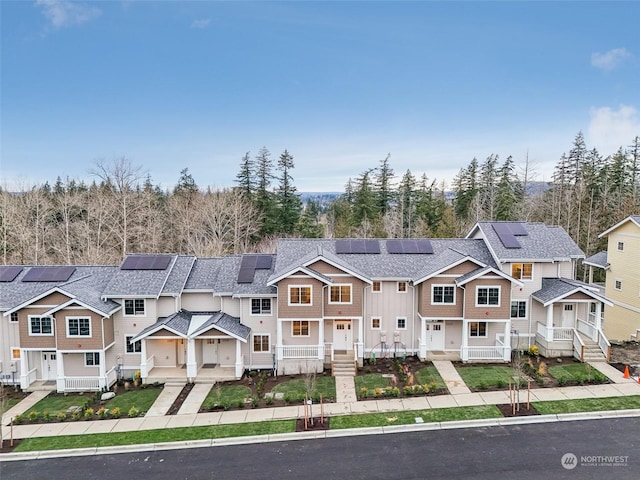 townhome / multi-family property with solar panels