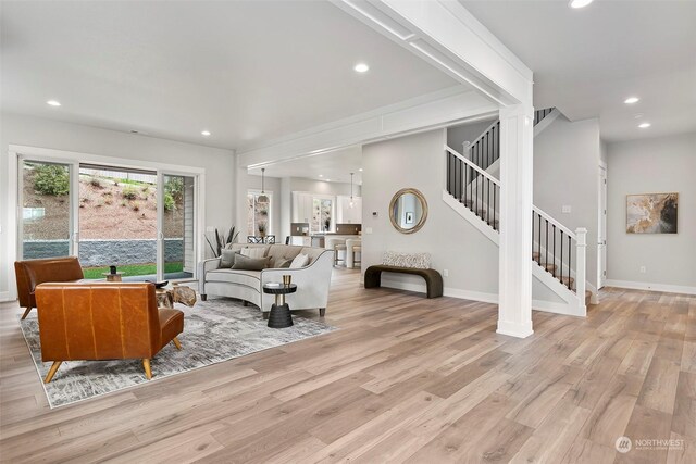 living room with light hardwood / wood-style floors