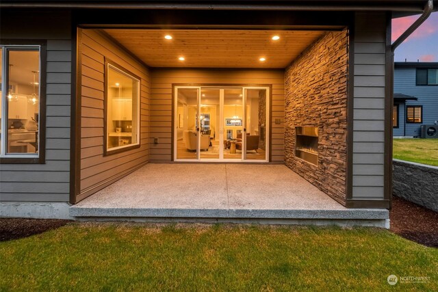 exterior space featuring a patio area and a yard