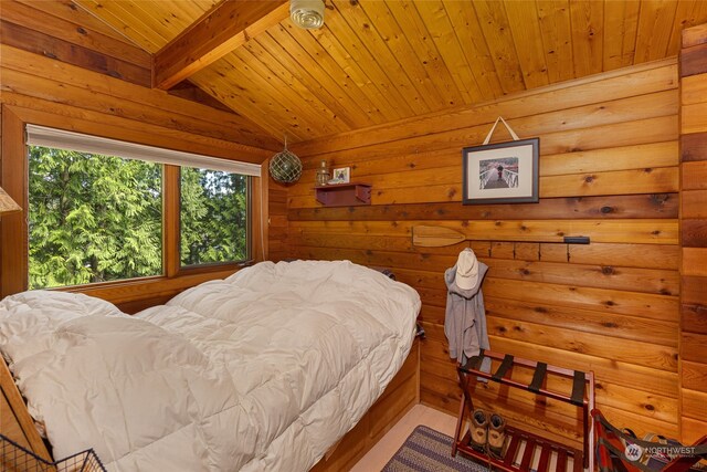 bedroom with wood ceiling and vaulted ceiling with beams