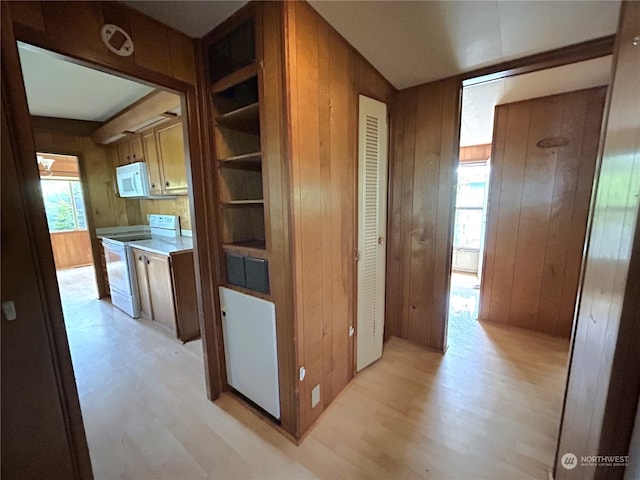 1411 300th Pl, Ocean Park, WA 98640 - corridor featuring wood walls and light hardwood / wood-style flooring