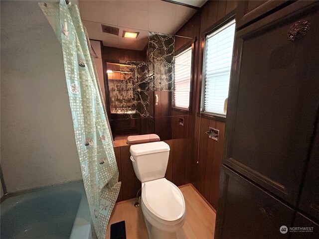 1411 300th Pl, Ocean Park, WA 98640 - bathroom featuring toilet and shower / bath combo with shower curtain
