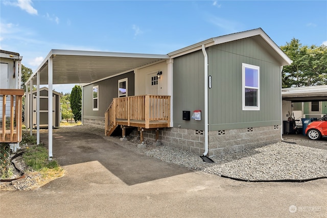 exterior space with a carport