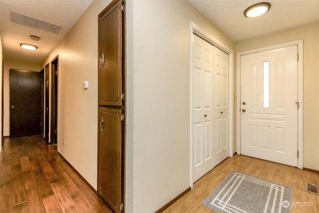 entrance foyer with hardwood / wood-style flooring