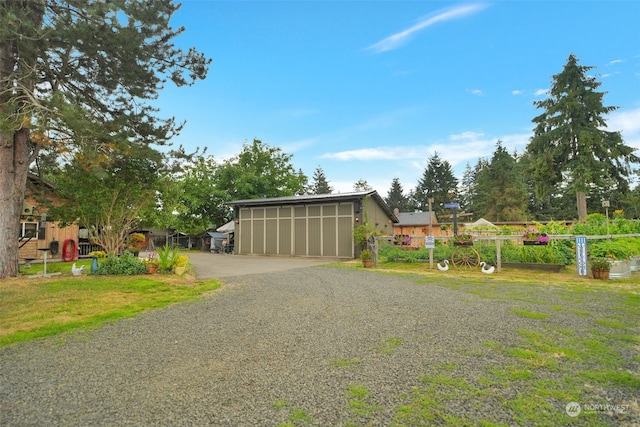 exterior space featuring gravel driveway