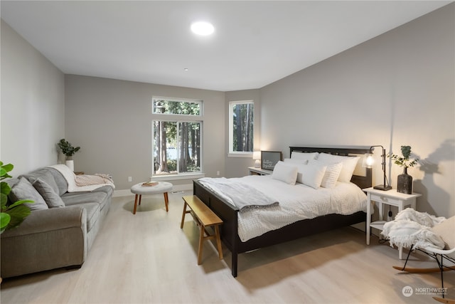 bedroom with light hardwood / wood-style floors