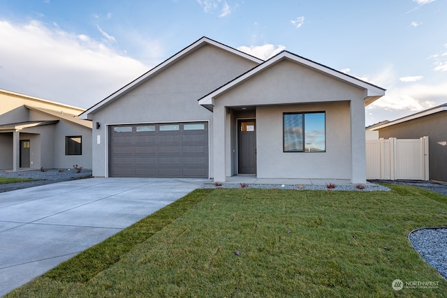 view of front facade with a front yard and a garage