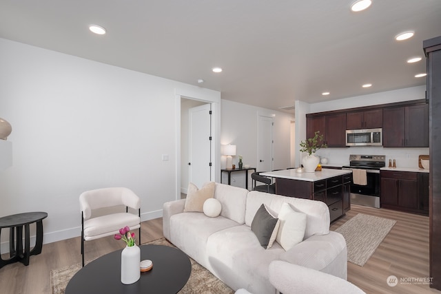 living room with light hardwood / wood-style floors