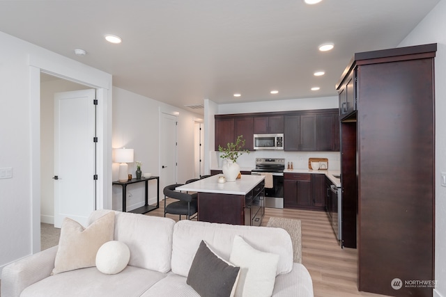 living room with light hardwood / wood-style floors