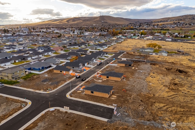 drone / aerial view featuring a mountain view