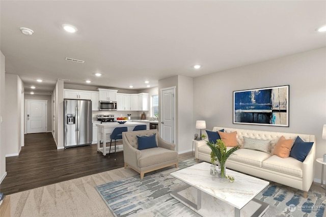 living room with wood-type flooring