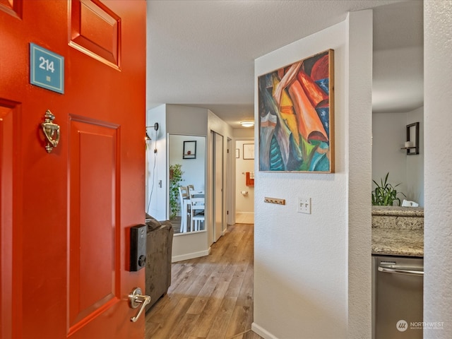 hall featuring light wood-type flooring