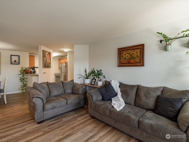 living room with light hardwood / wood-style floors