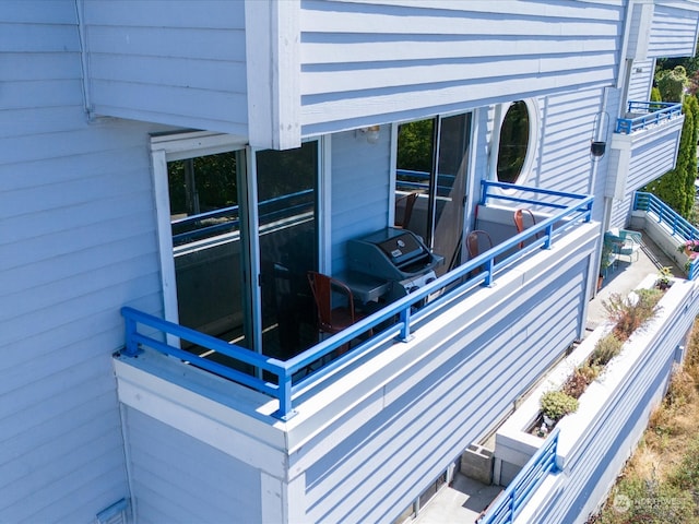 exterior details featuring wood walls