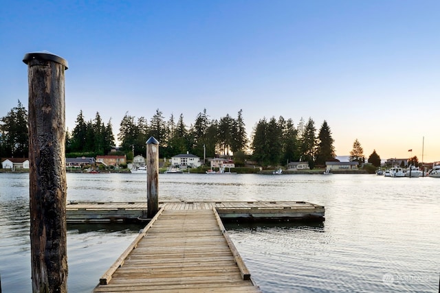 view of dock with a water view