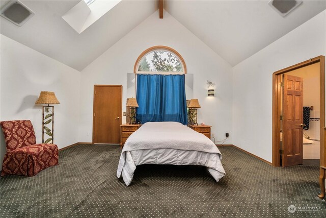 bedroom with high vaulted ceiling, a skylight, dark colored carpet, and beamed ceiling