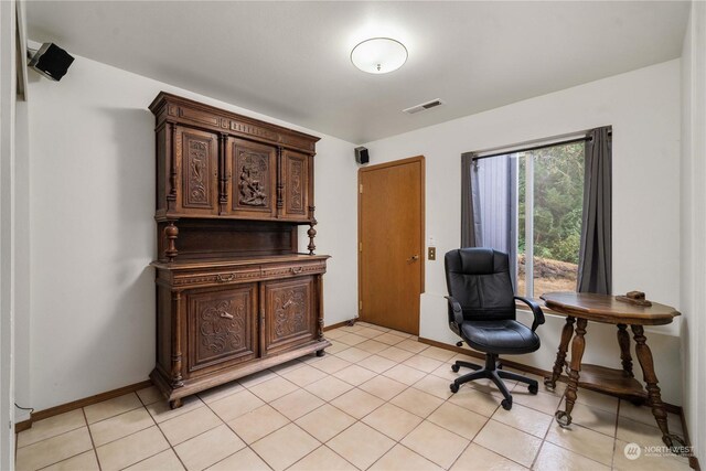 office with light tile patterned flooring