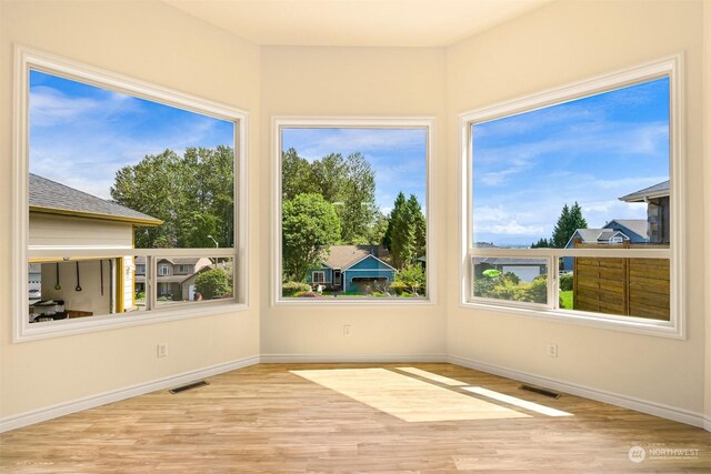 view of unfurnished sunroom