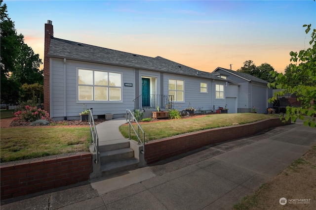 single story home with roof with shingles, a chimney, and a front lawn