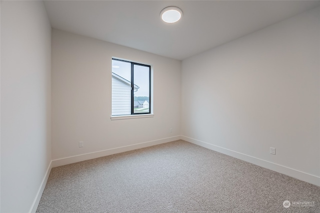 unfurnished room featuring carpet floors