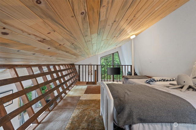 bedroom with vaulted ceiling and wood ceiling