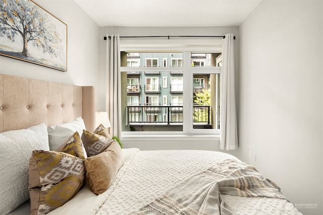 bedroom featuring multiple windows