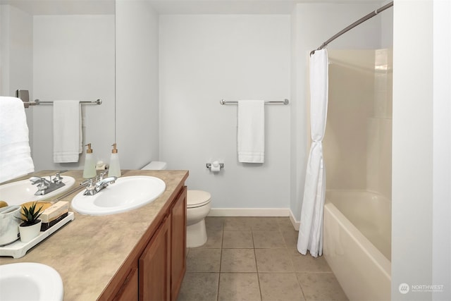 full bathroom with tile patterned flooring, toilet, shower / tub combo, and vanity