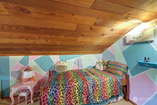 carpeted bedroom with wood ceiling and lofted ceiling