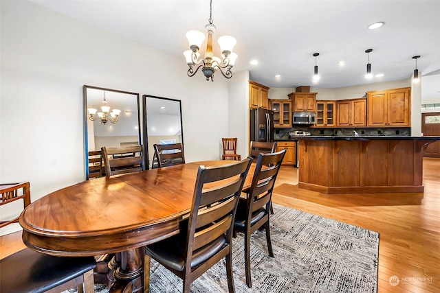 1001 Lakeview Dr, Ilwaco, WA 98624 - dining area featuring a chandelier, light wood-style floors, and recessed lighting