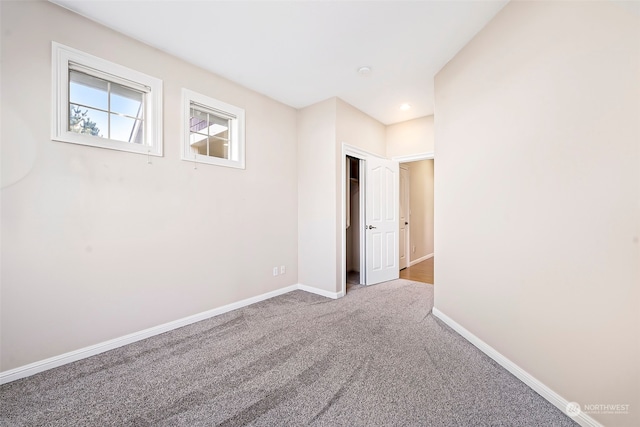 unfurnished room featuring carpet floors