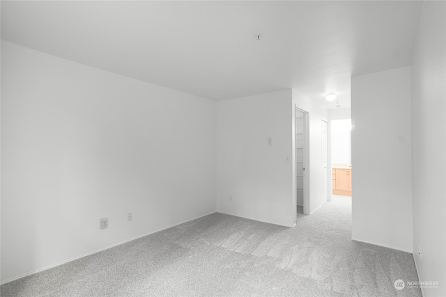 bonus room with light carpet