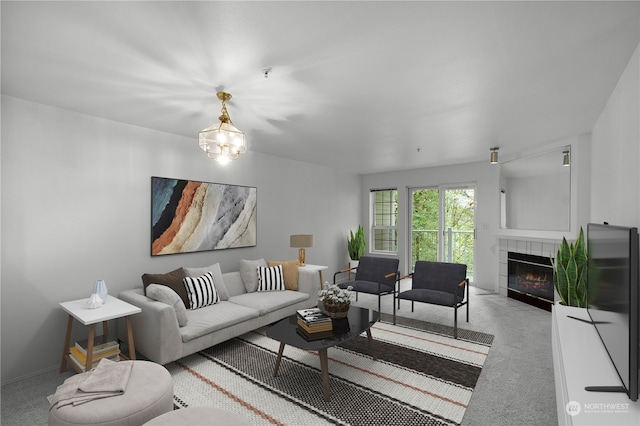 living room featuring a tile fireplace and light colored carpet